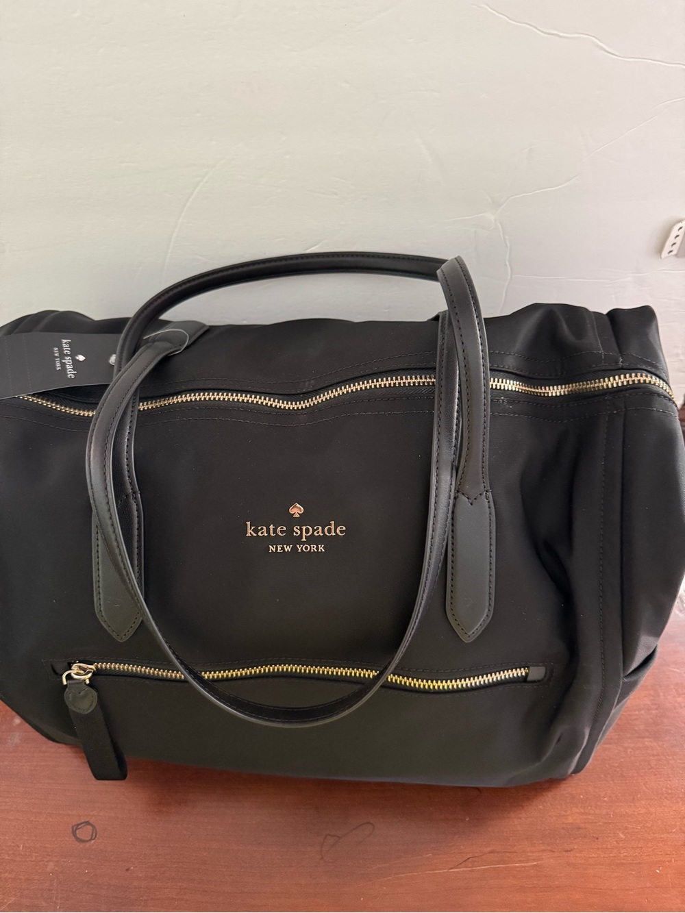 kate spade black nylon tote with gold logo